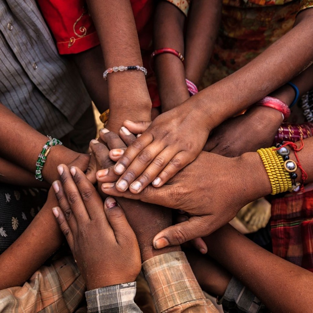 Hands joined together in solidarity